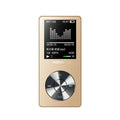 Gold metal MP3 music player with 1.8-inch screen showing menu, placed on a dark surface.