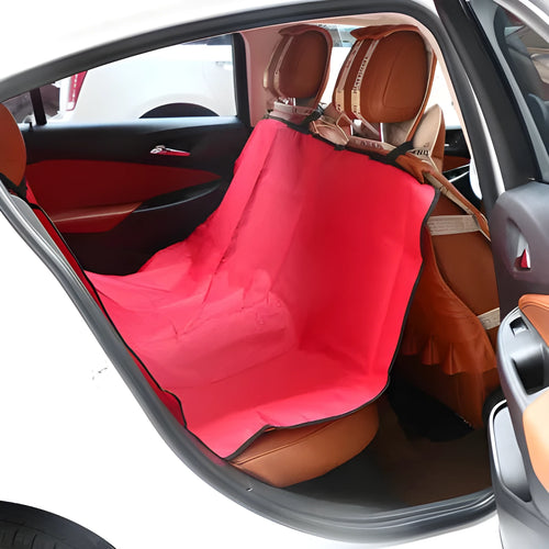 Square red car pet pad made of Oxford fabric with waterproof backing, shown on a car seat.