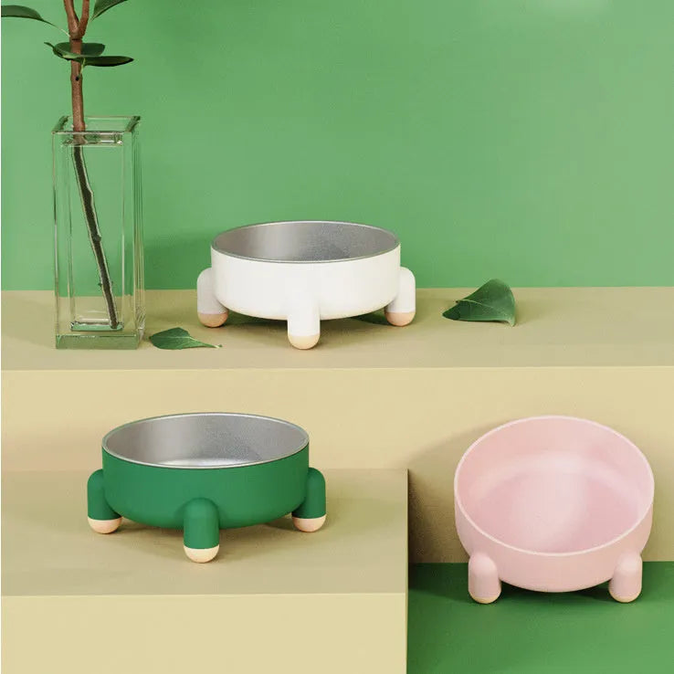 Stainless steel pet food bowl with non-slip base in pink, white and green colours