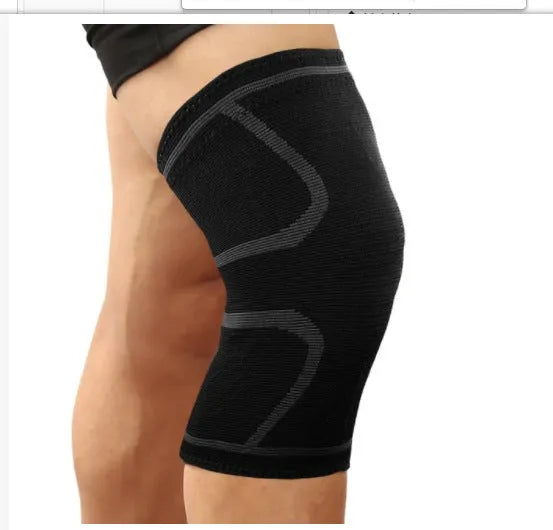 Stretch polyester sports kneepad with corrugated texture in black, shown on a knee.