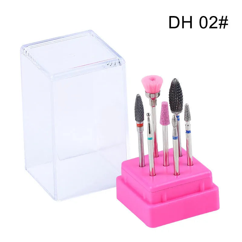 Set of seven tungsten steel nail drill bits and a brush in a transparent storage case.