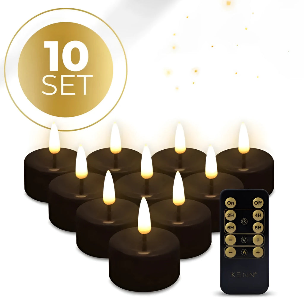 Four black LED flameless tealight candles showing their size and flickering flame effect.