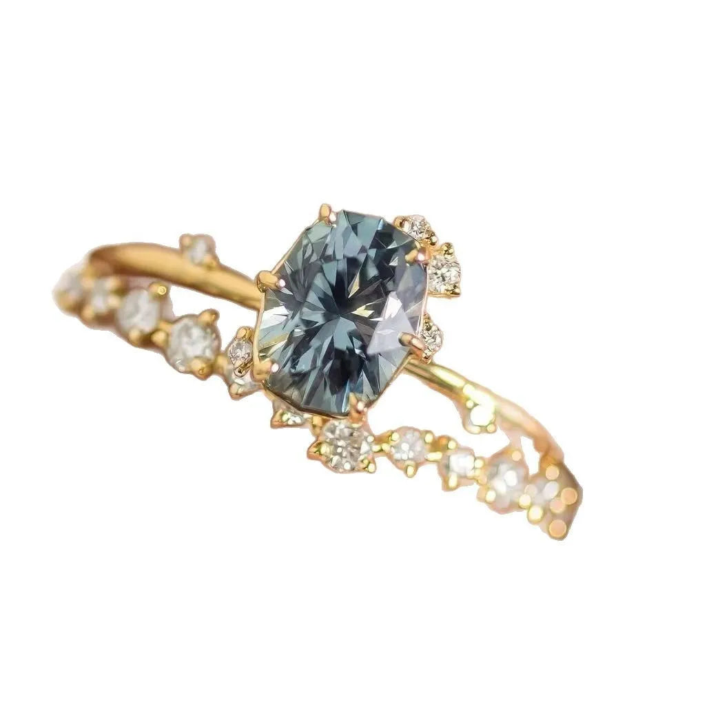 Gold plated women's ring with green zircon stone in flower shape on alloy base