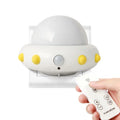 Remote control UFO shaped bedside night light in blue, pink, or white colour.