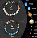 Set of two natural stone beaded bracelets for zodiac signs on a dark background.