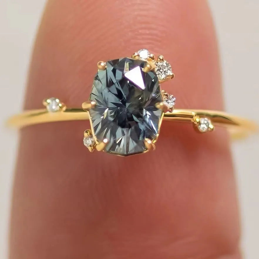 Gold plated women's ring with green zircon stone in flower shape on alloy base