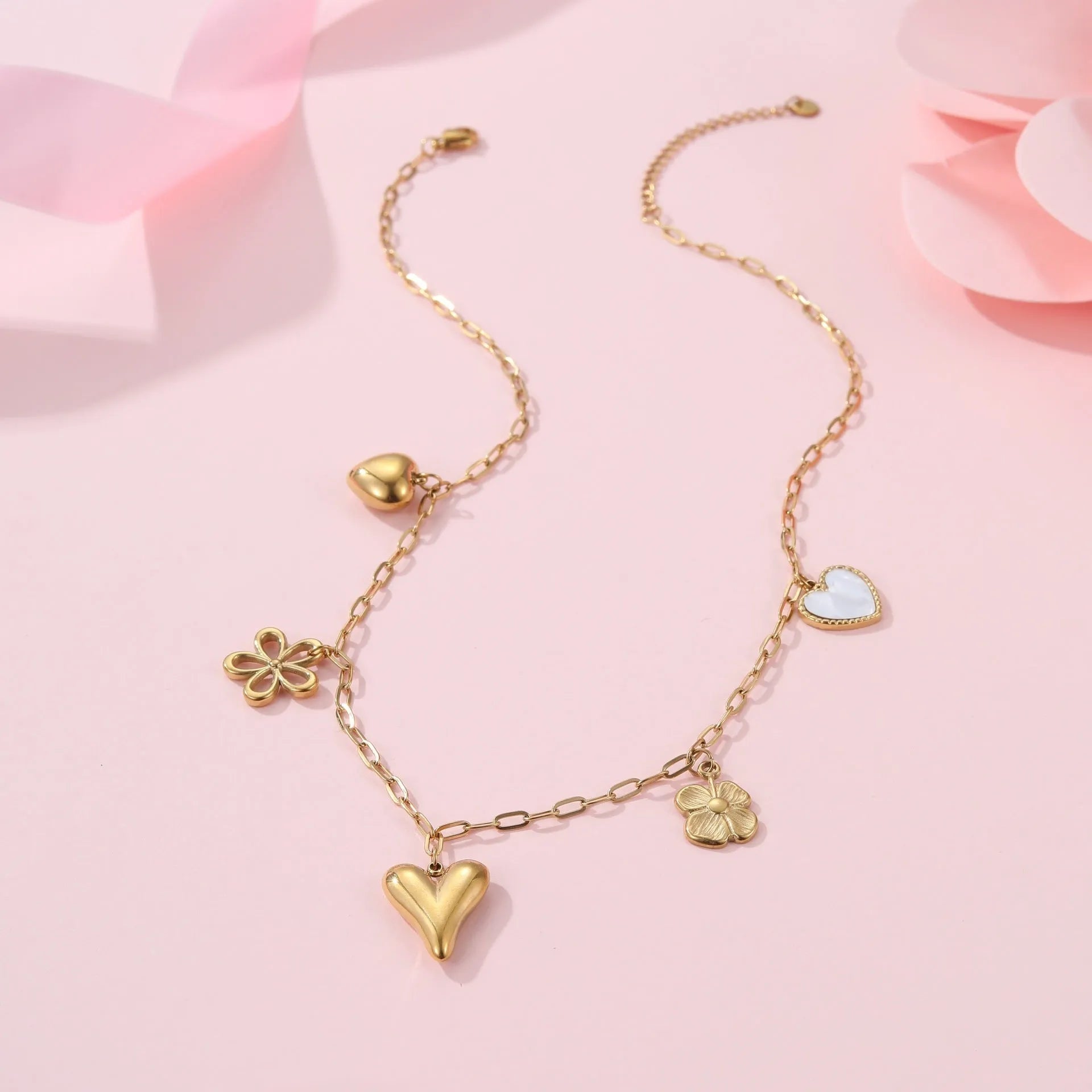 Stainless steel geometric sun pendant necklace with 18K gold electroplated finish on 41-50cm chain