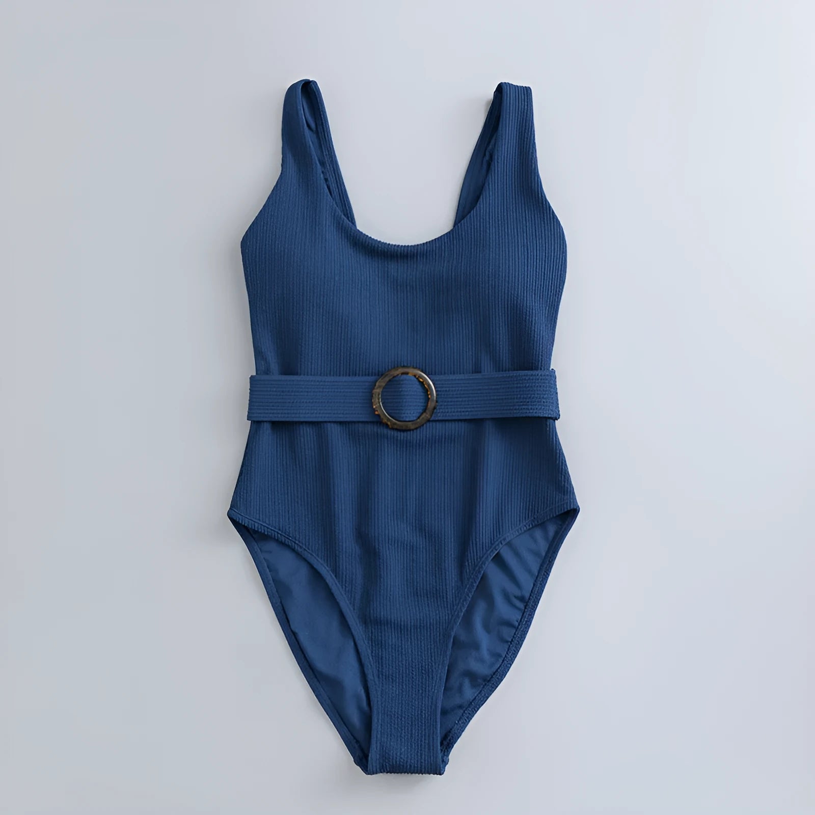 Navy blue women's one-piece slimming swimsuit with triangle top and chest pads on a white background.