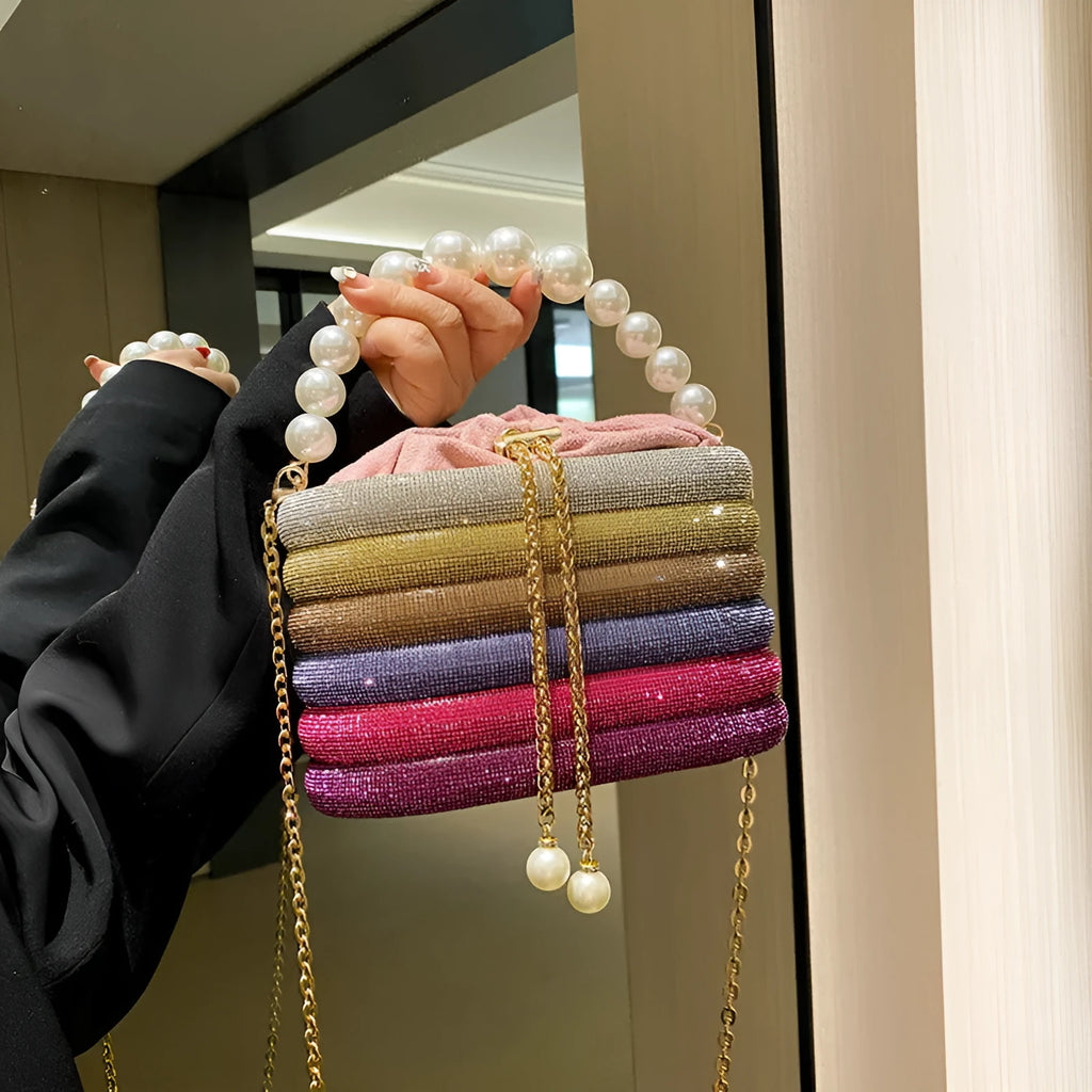 Women's retro style crossbody handbag with beaded pearl details on soft PU leather in a choice of colours.