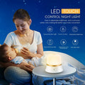 White touch-control bedside night light with rechargeable battery shown next to a USB cable.