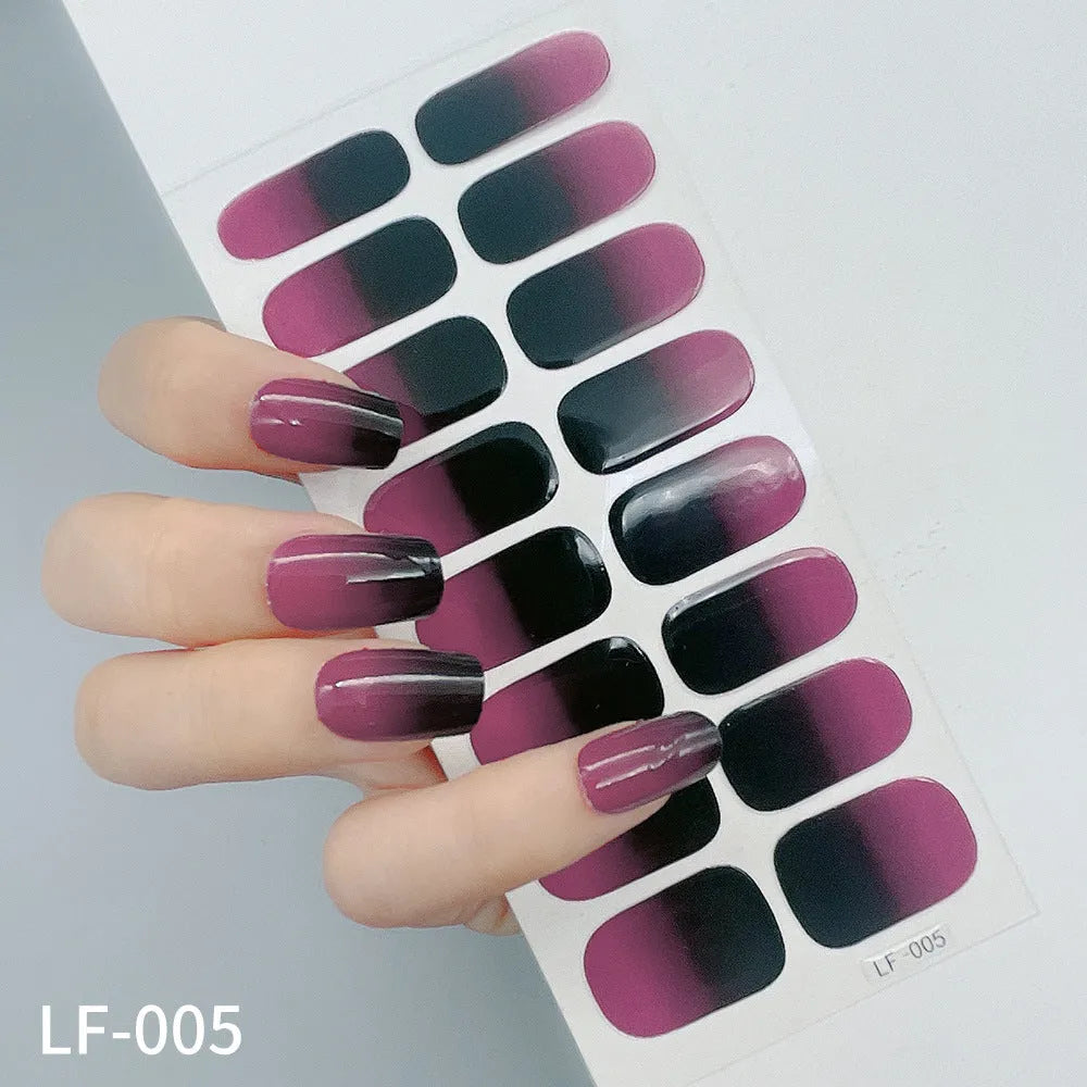 Sheet of 16 solid colour nail art sticker designs including cross, rose, and leopard print patterns.