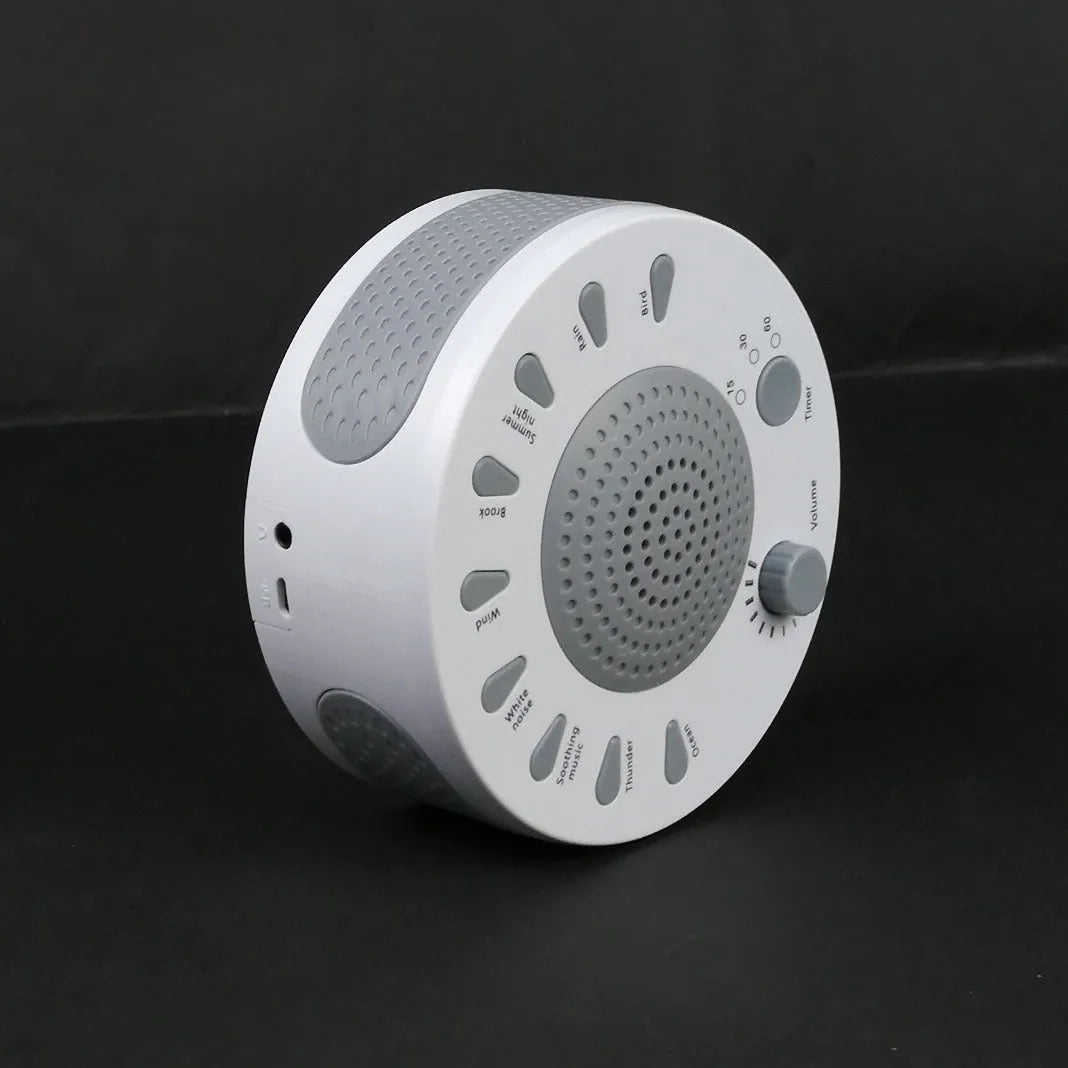 White noise sleep instrument with volume knob and multiple sound options in compact packaging