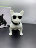 Mini bulldog-shaped Bluetooth speaker in black, red, or white colour with wireless audio functionality
