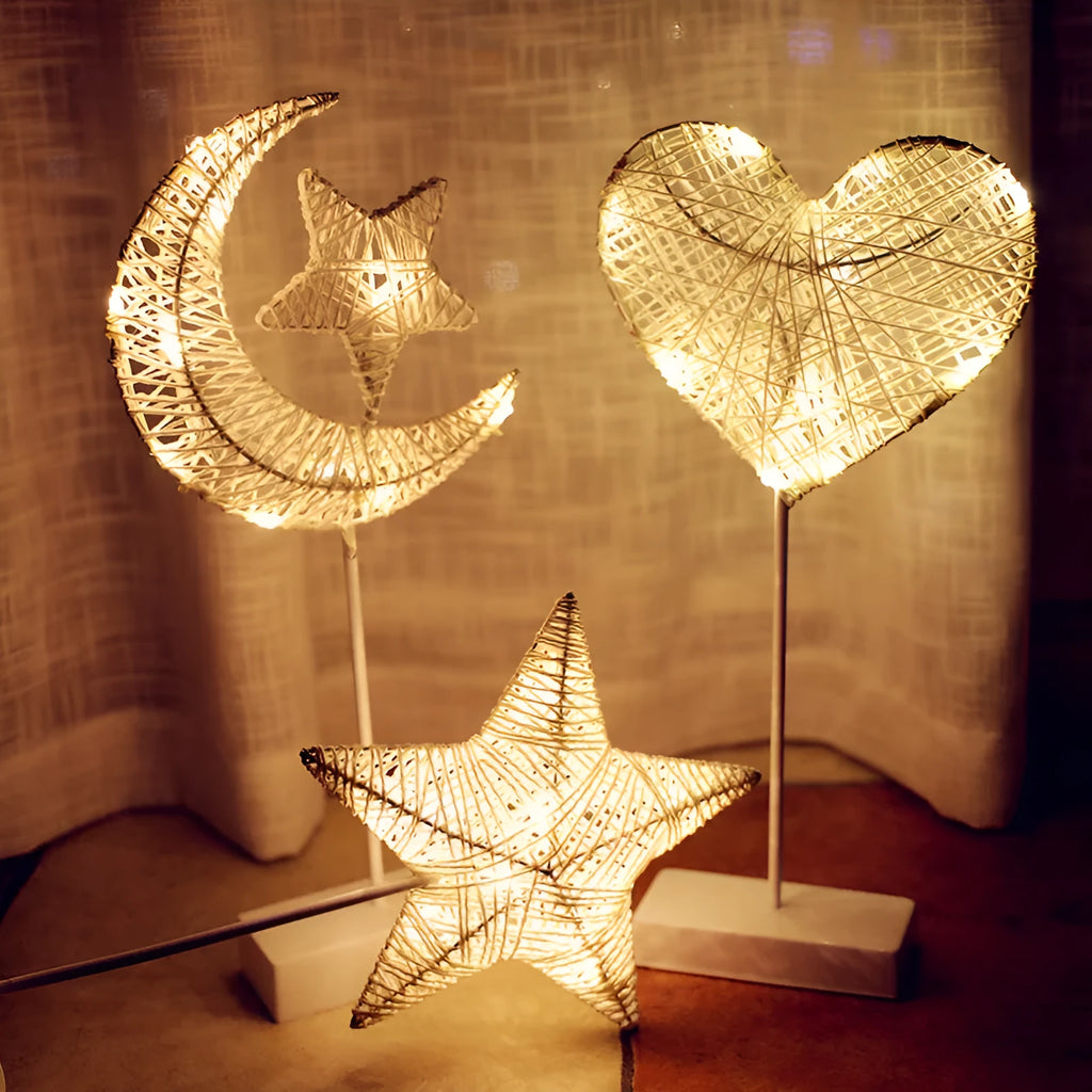 LED string lights with star, heart and moon shapes made from rattan and copper wire for bedroom decoration