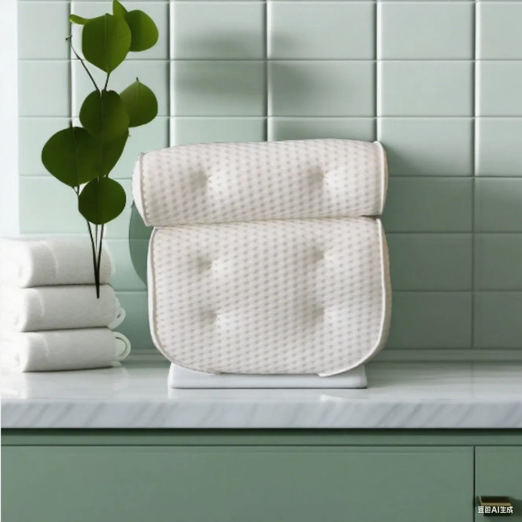 White 4D mesh bathtub pillow with suction cups, shown on bathtub edge.