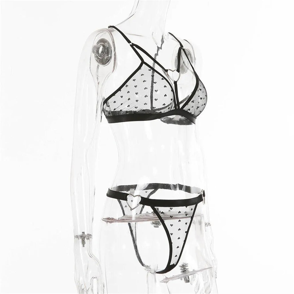 Ladies black mesh spandex two-piece activewear set, showing top and pants.