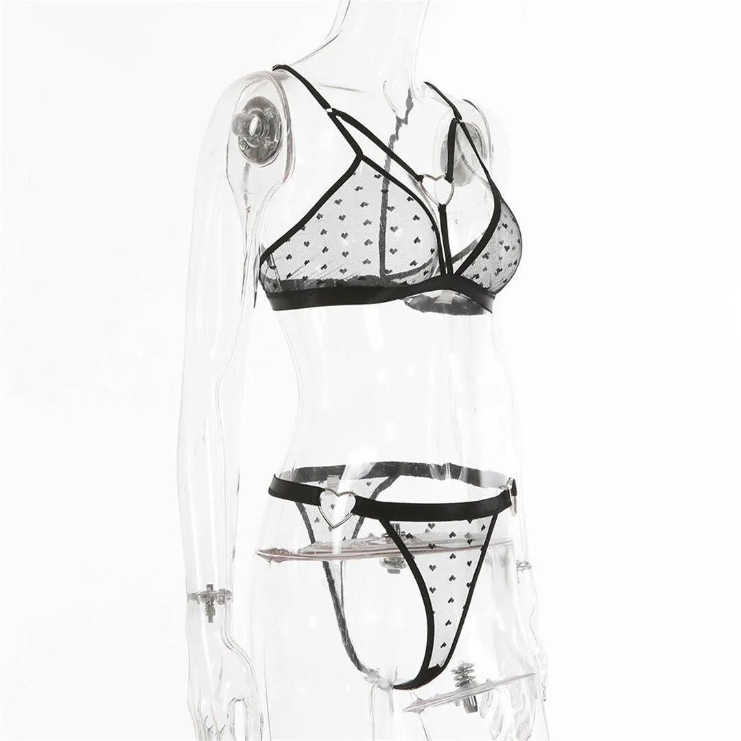 Ladies black mesh spandex two-piece activewear set, showing top and pants.