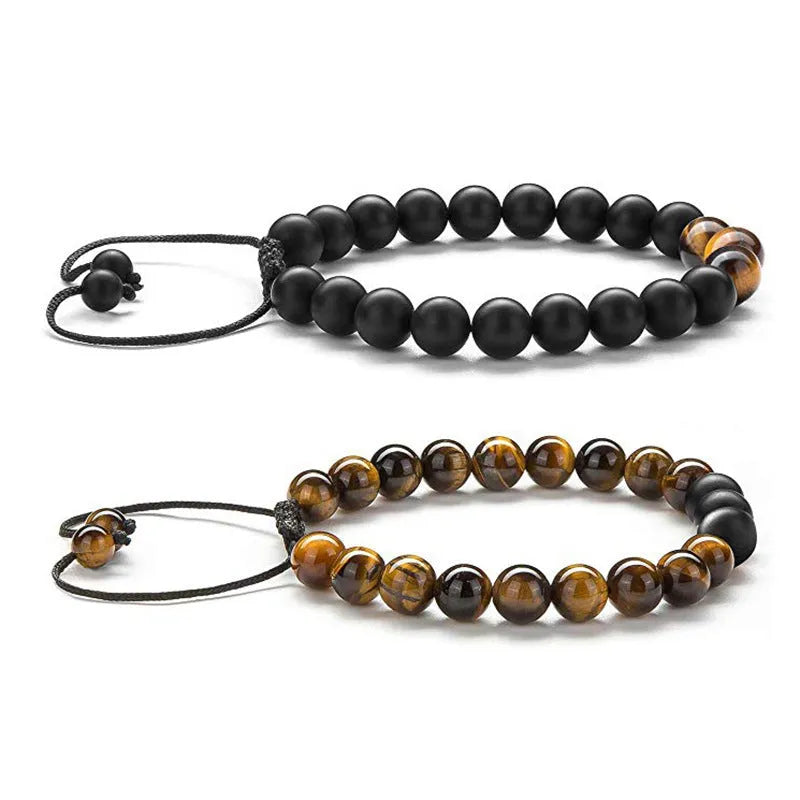 Geometric couple bracelet made of matte black agate beads with a tiger eye stone.