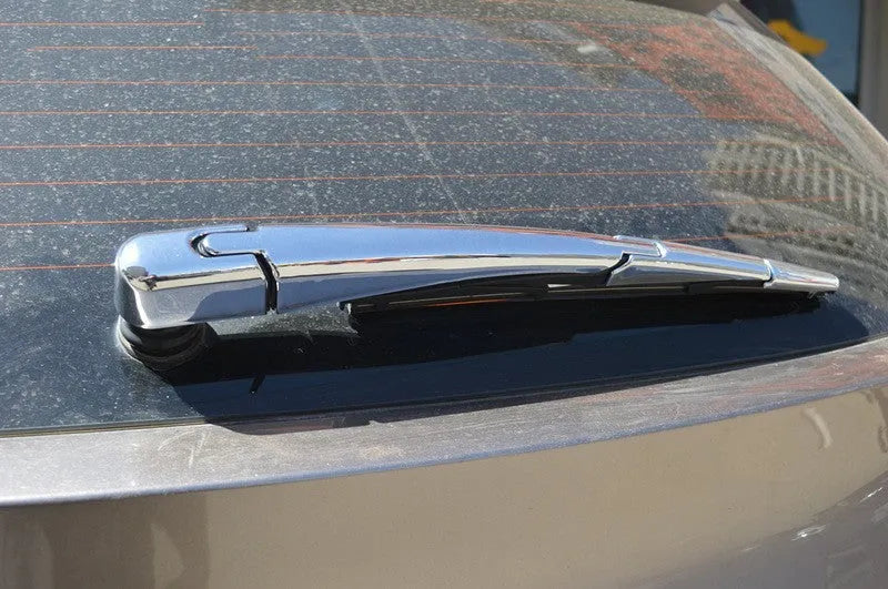 Set of four silvery ABS plastic rear wiper cover trims for a 2010 Hyundai.