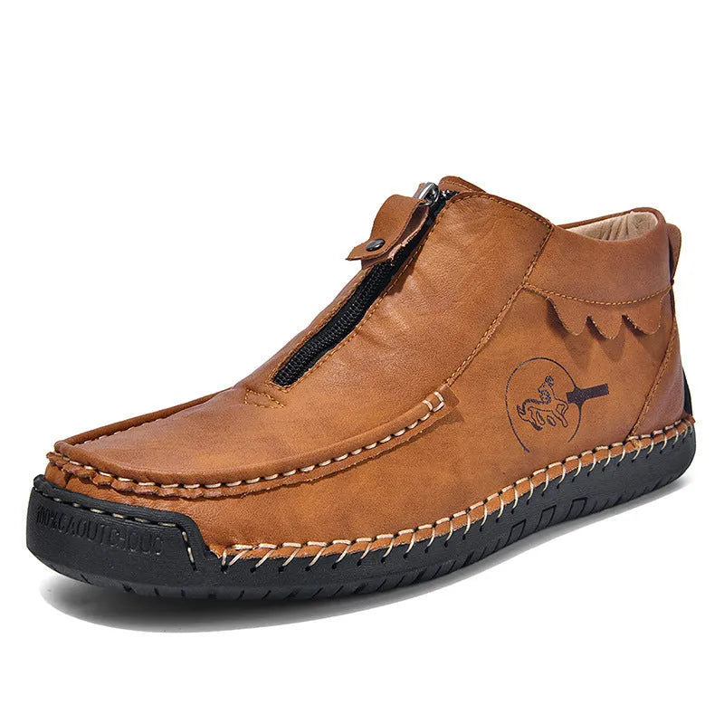 Men's black slip-on loafers with round toe and low heel design showing sewing detail on PU upper