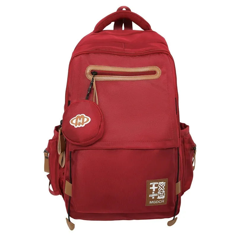 Large-capacity black nylon school backpack for junior high students with curved shoulder straps