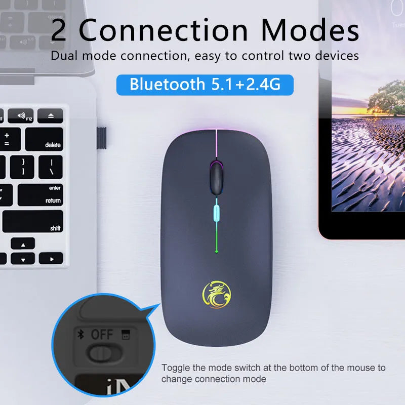 Black and white luminous wireless mouse with blue glowing scroll wheel indicating low battery