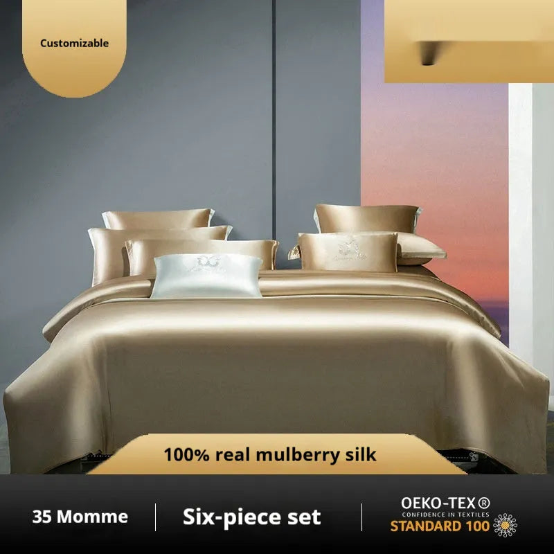Solid colour silk quilt cover set on a bed in champagne gold, showing flat sheet and pillowcases.