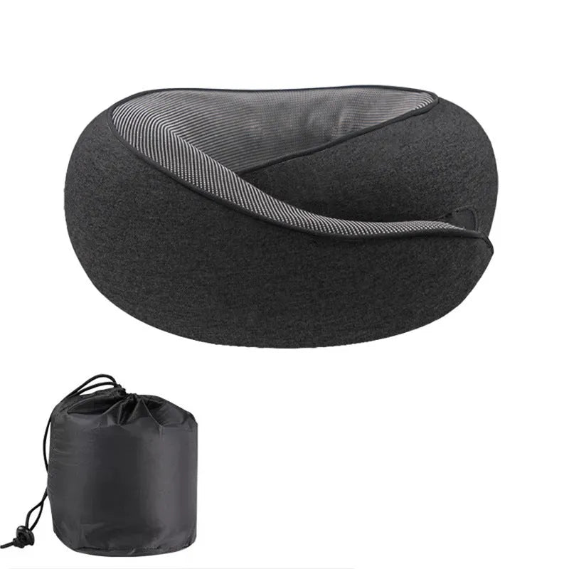 U-shaped memory foam travel neck pillow in a storage bag, shown in dark grey colour.
