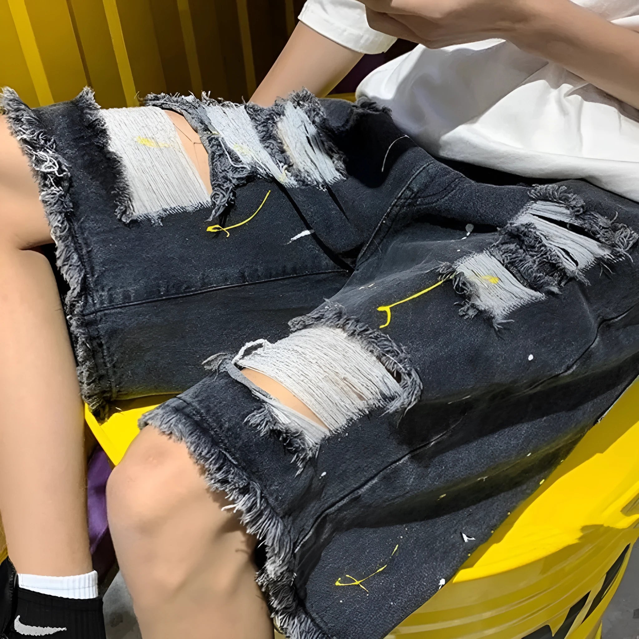 Men's casual water-washed denim shorts with distressed holes in black or light blue
