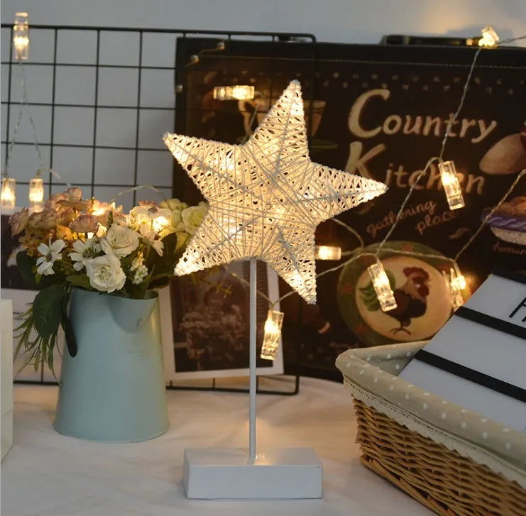LED string lights with star, heart and moon shapes made from rattan and copper wire for bedroom decoration
