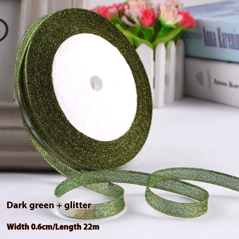 Roll of polyester gift ribbon showing 0.6cm width and multiple colour options including metallic finishes