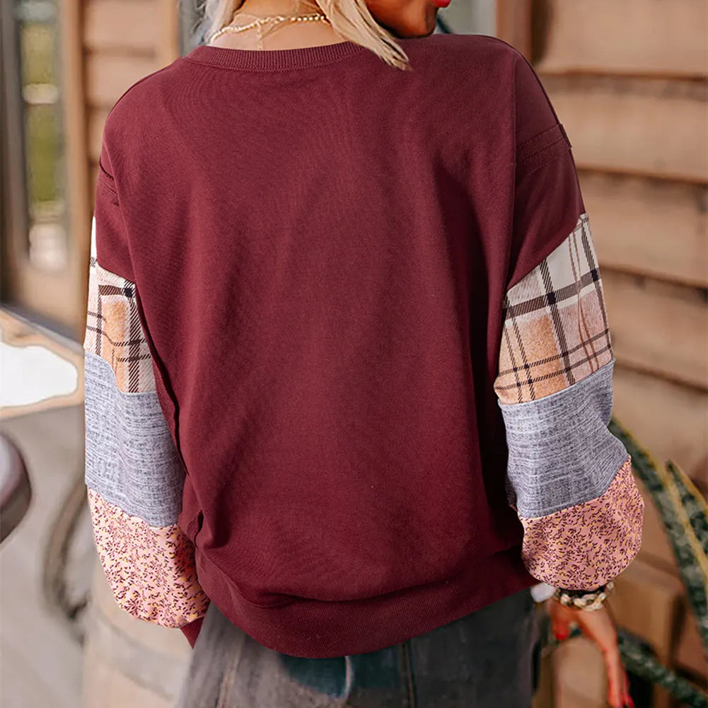 Women's beige and red plaid stitching long-sleeved loose fit casual pullover top.