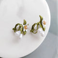 Sterling silver needle camellia earrings with flower ear clip design and contrast colour detailing