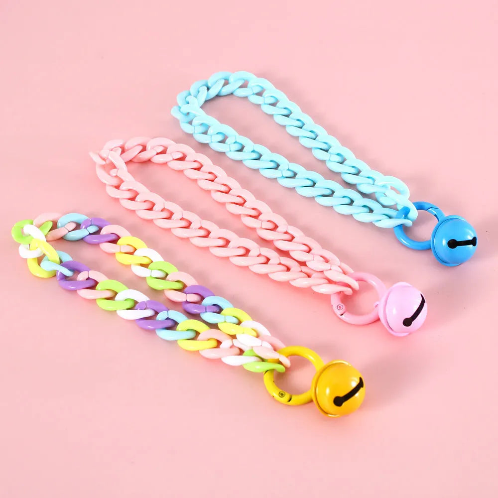 Macaron candy coloured plastic pet collar for cats, dogs, and rabbits in chain blue, pink, and mixed colours on a white background.