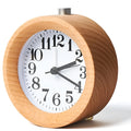 Solid beech wood traditional alarm clock with silent snooze function measuring 9.5cm in diameter