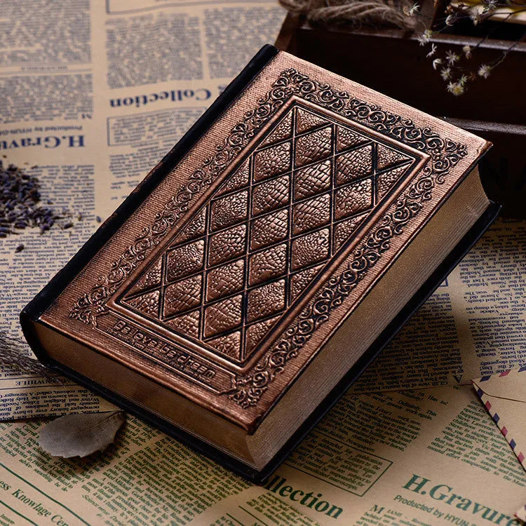 Embossed faux leather notepad in bronze colour option showing its textured cover and thick profile.