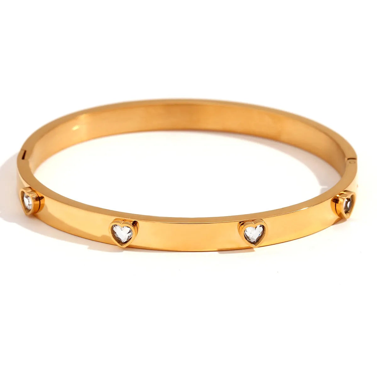 Stainless steel women's bracelet with peach heart charm in electroplated golden colour