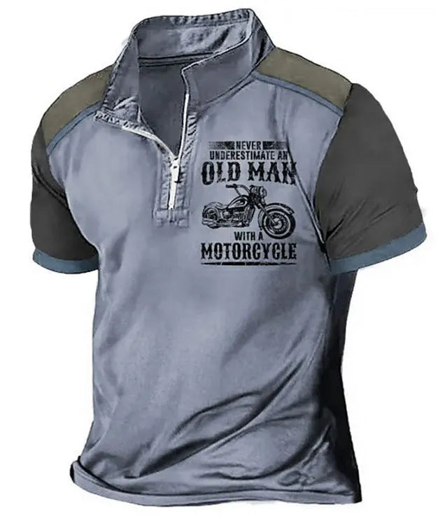 Man wearing a casual lapel polo shirt with a digital print design and zipper detail.