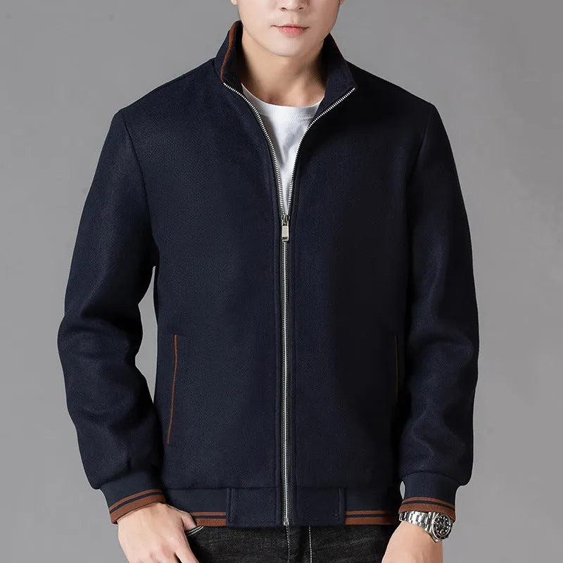 A grey men's sporty fleece jacket with long sleeves and a stick pocket, shown on a hanger.