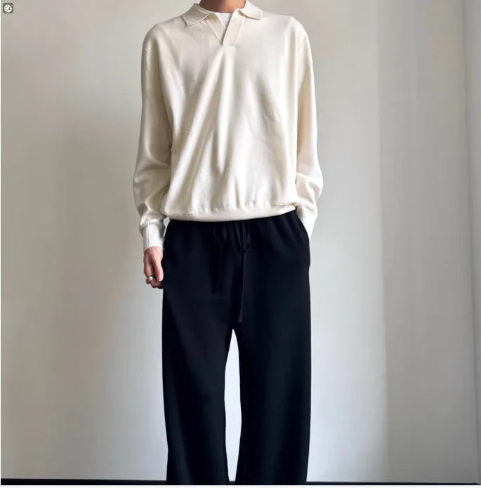 Pure wool polo sweater with lapel collar in milky white and navy blue colours