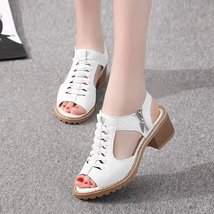 Women's retro sandals with side zip closure and a medium heel in creamy white.