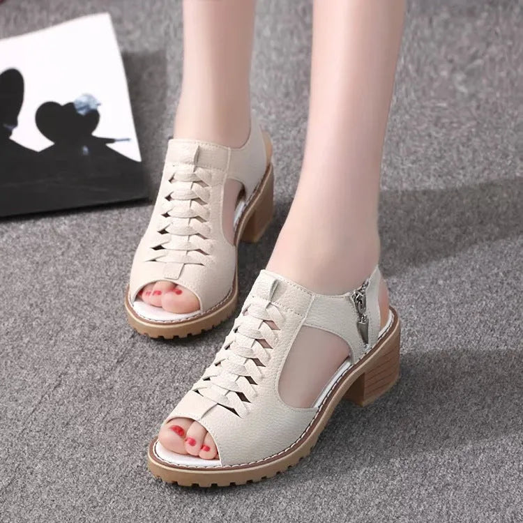 Women's retro sandals with side zip closure and a medium heel in creamy white.