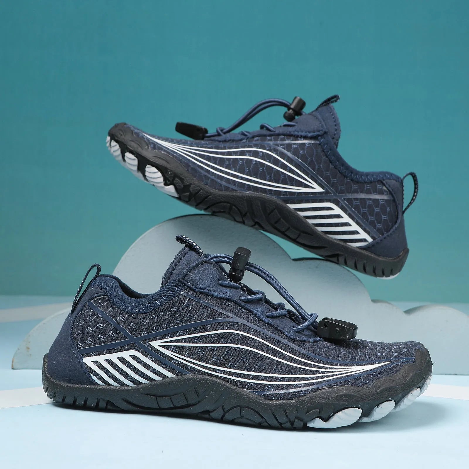 Children's elasticated water shoes in blue with a non-slip rubber sole and breathable mesh upper.