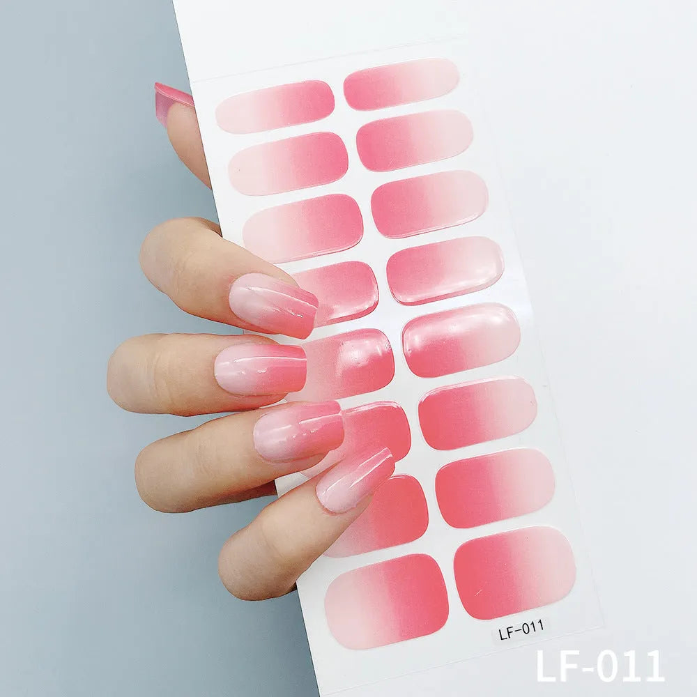 Sheet of 16 solid colour nail art sticker designs including cross, rose, and leopard print patterns.