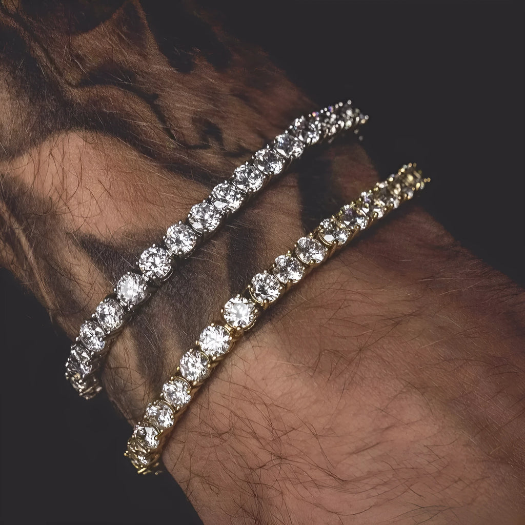 Men's silver geometric hip hop bracelet with rhinestone chain links and dangling zirconia tennis charms on a white background.