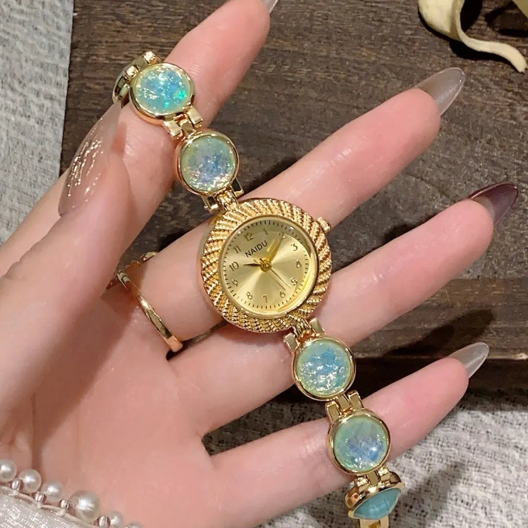 Women's quartz watch with 25mm round dial and zinc alloy case in multiple colour options