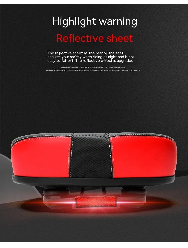 Large red bicycle saddle with reflective stickers, showing thickened design and shock absorber.