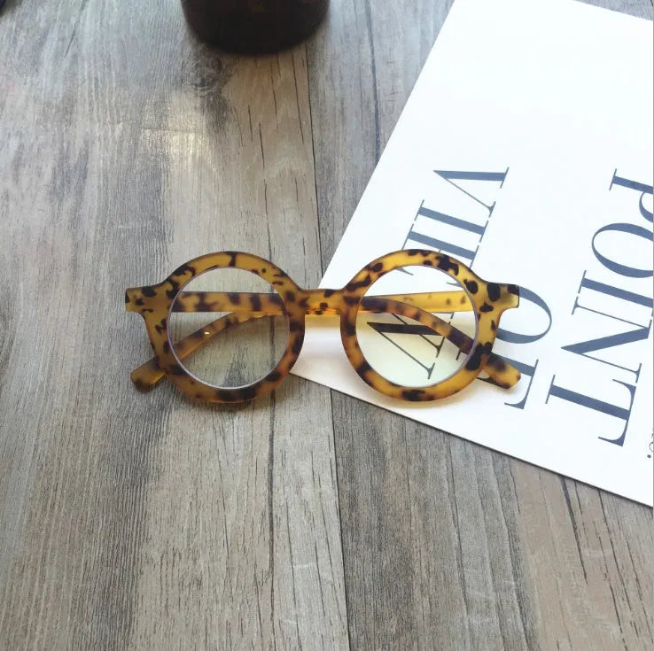 Retro round plastic frame glasses with anti-blue light filter in black, pink, leopard, red, white, or yellow.