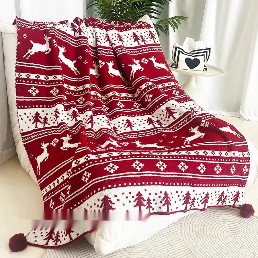 Personalised Christmas blanket with festive snowflake or reindeer pattern in acrylic fabric