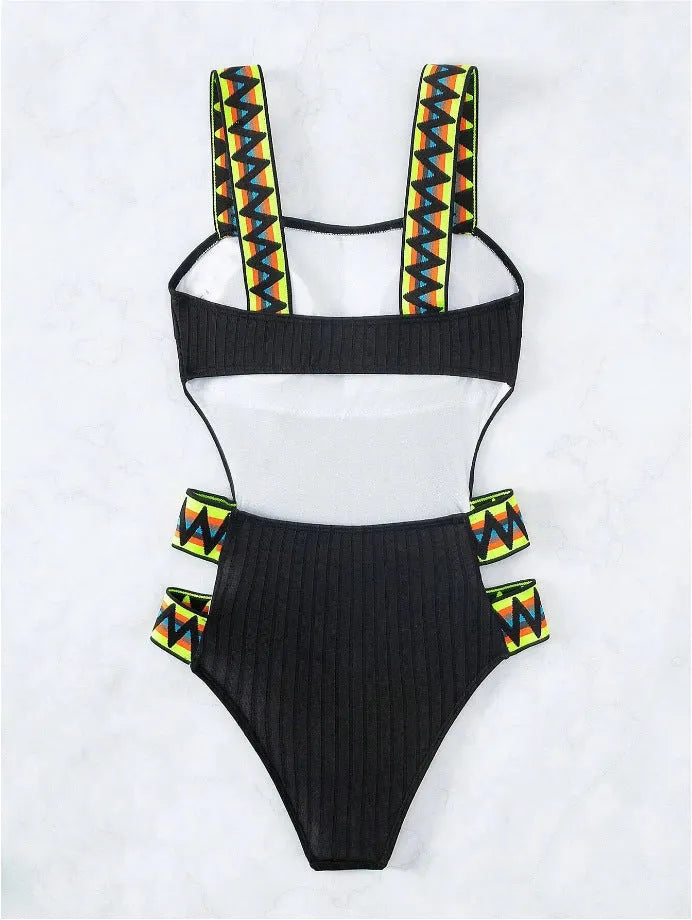 Women's solid colour one-piece bikini swimsuit in black or orange, made from polyester fabric.